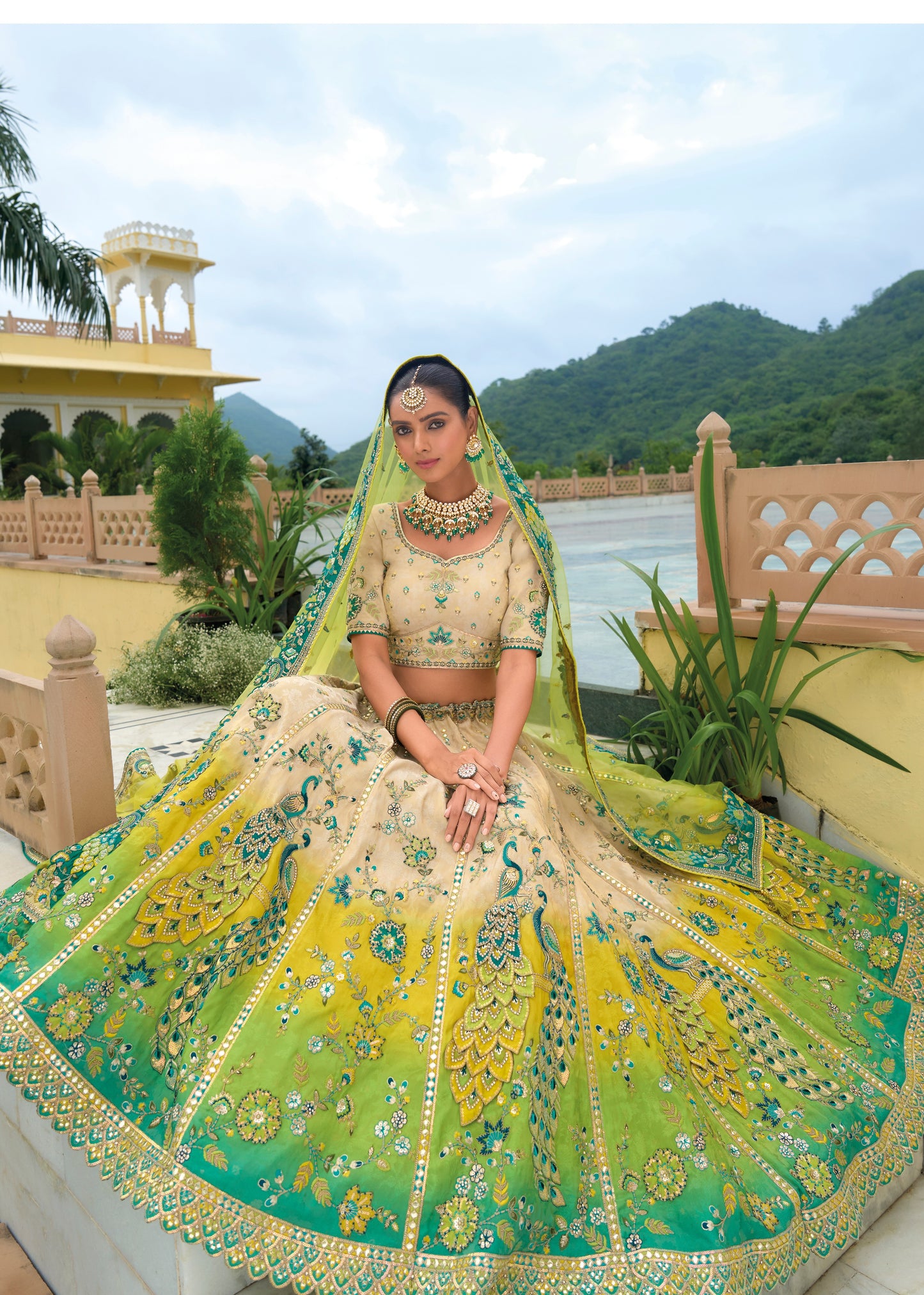 Luxury cream and green silk bridal lehenga choli with intricate embroidery designs, a perfect for wedding and bridal wear available online in Dubai UAE.