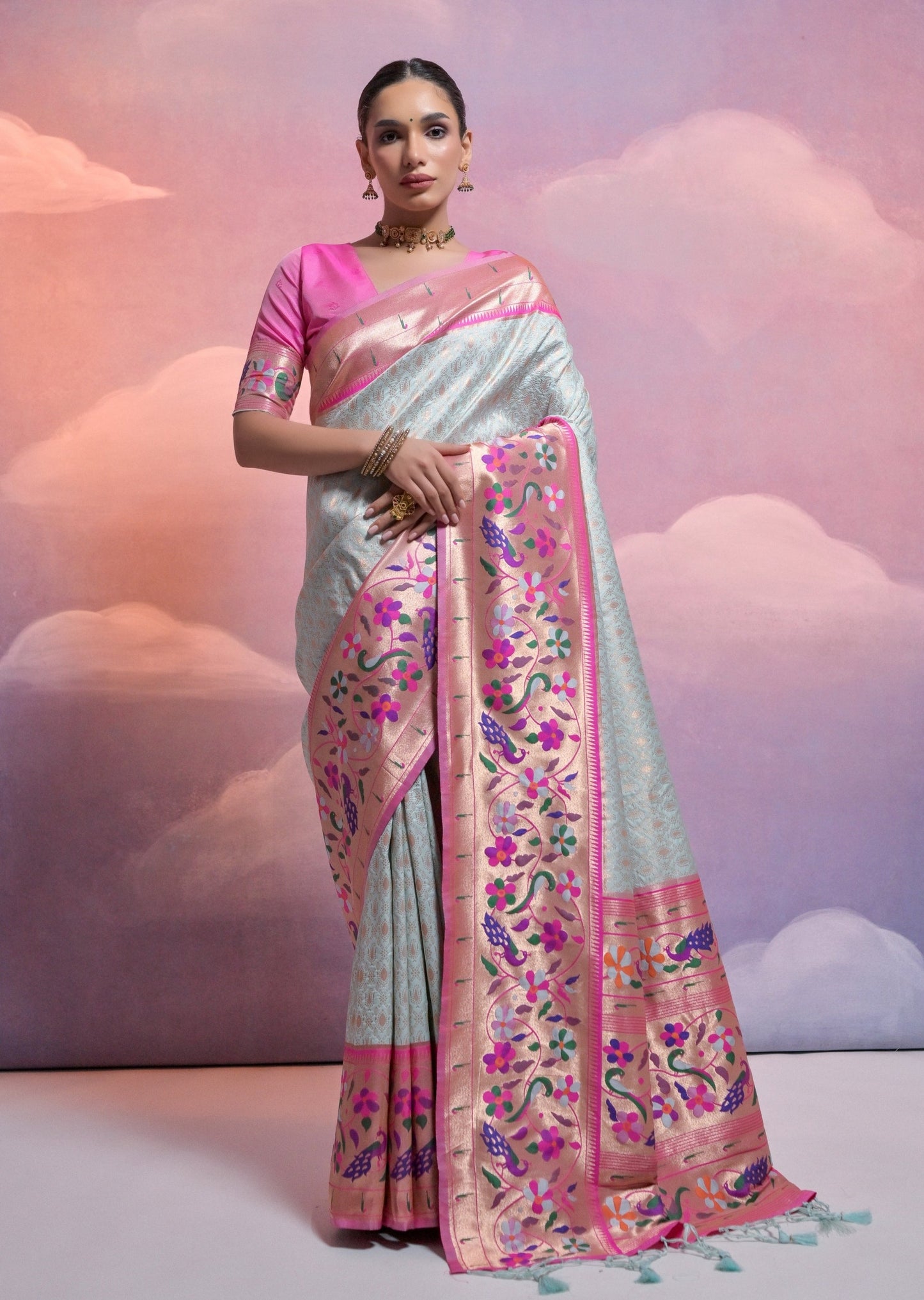 Sky blue triple muniya border paithani silk handloom saree.