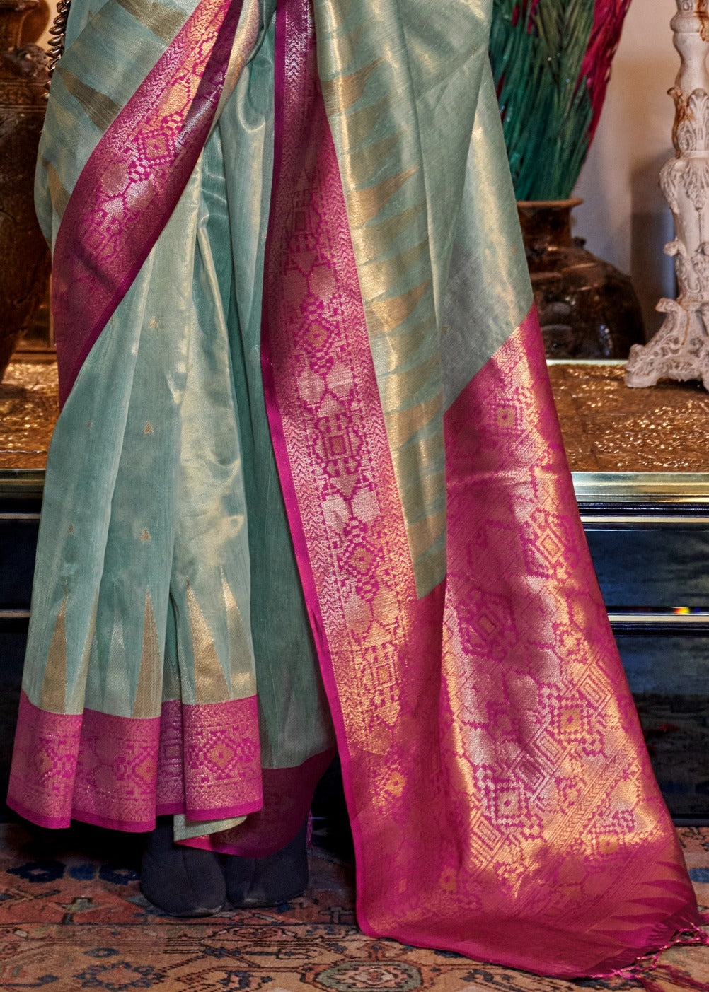 Banarasi tissue silk handloom saree online designs in india and usa with contrast magenta pink border pallu.