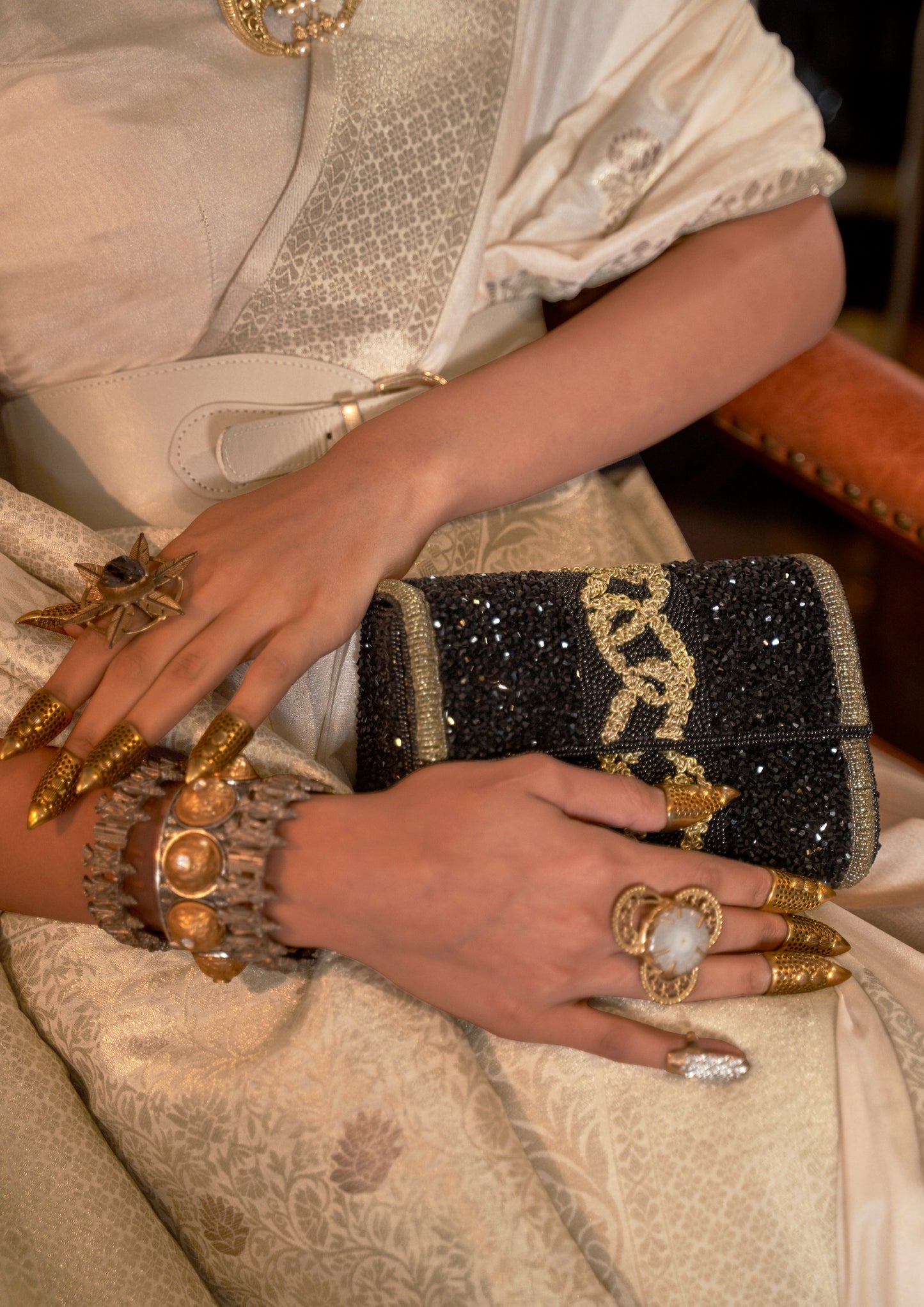 Zari work on white khaddi georgette banarasi saree.