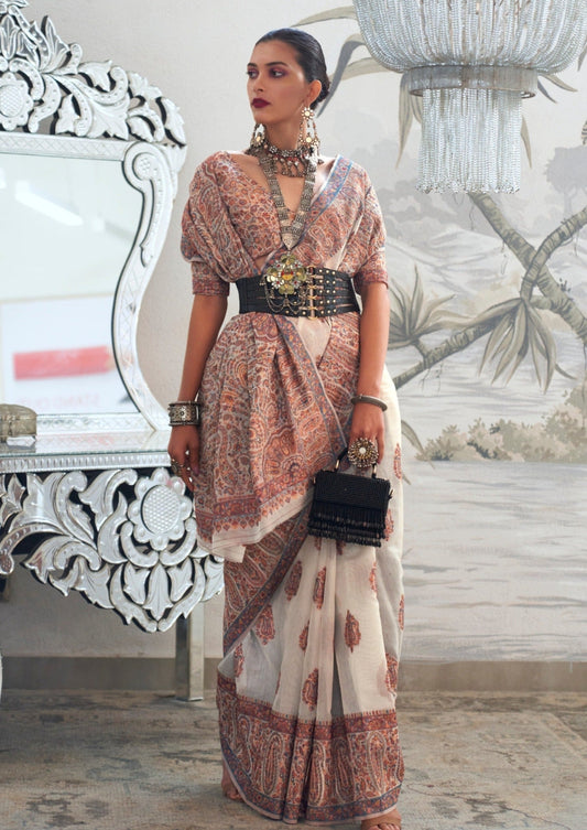 Woman in white pure kashmiri silk handloom saree blouse.