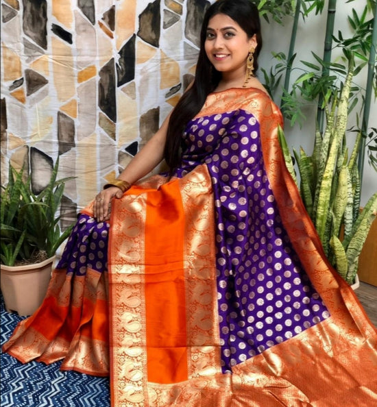 woman-sitting-in-purple-banarasi-saree