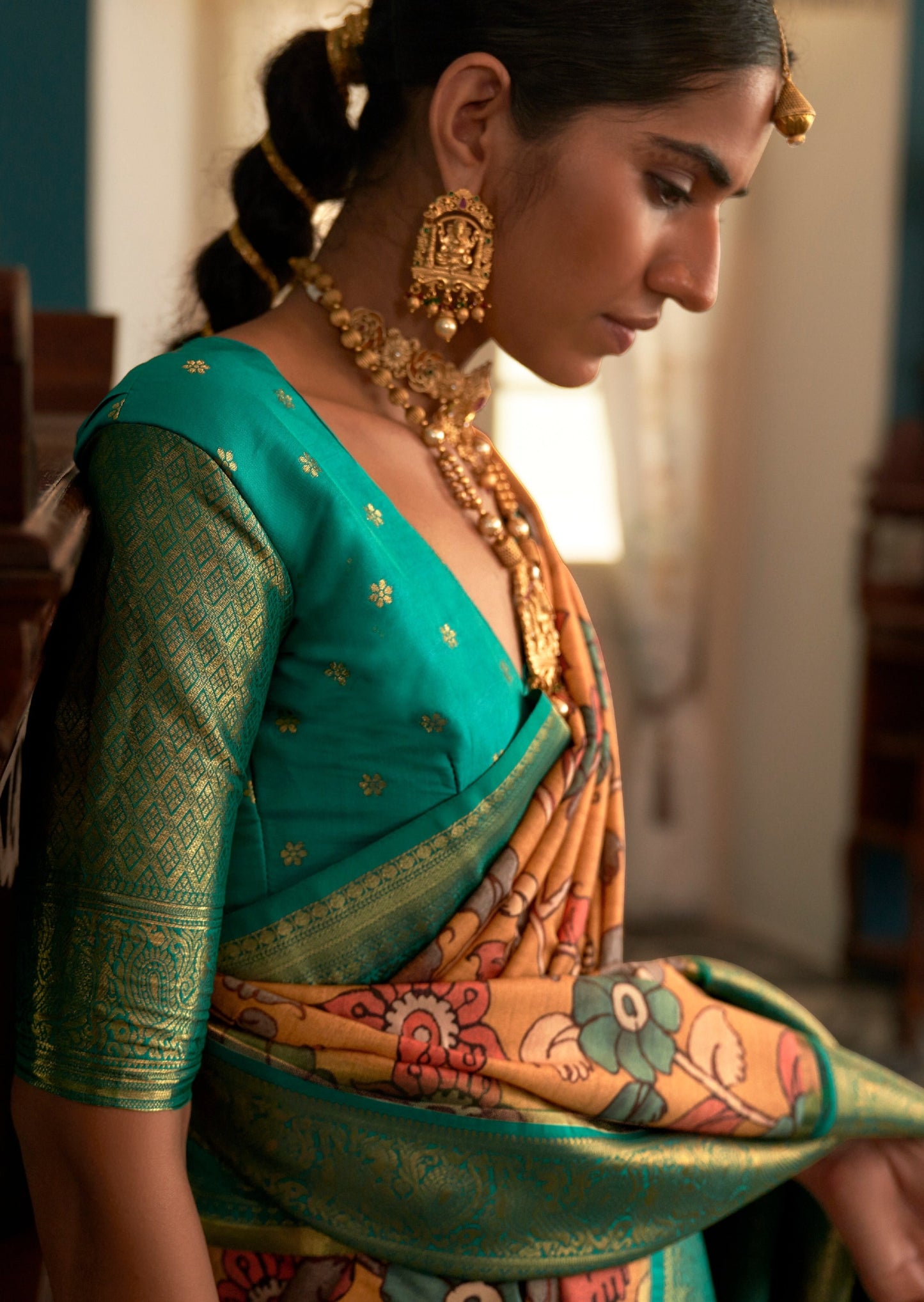 Yellow kalamkari saree with banarasi border online shopping designs.