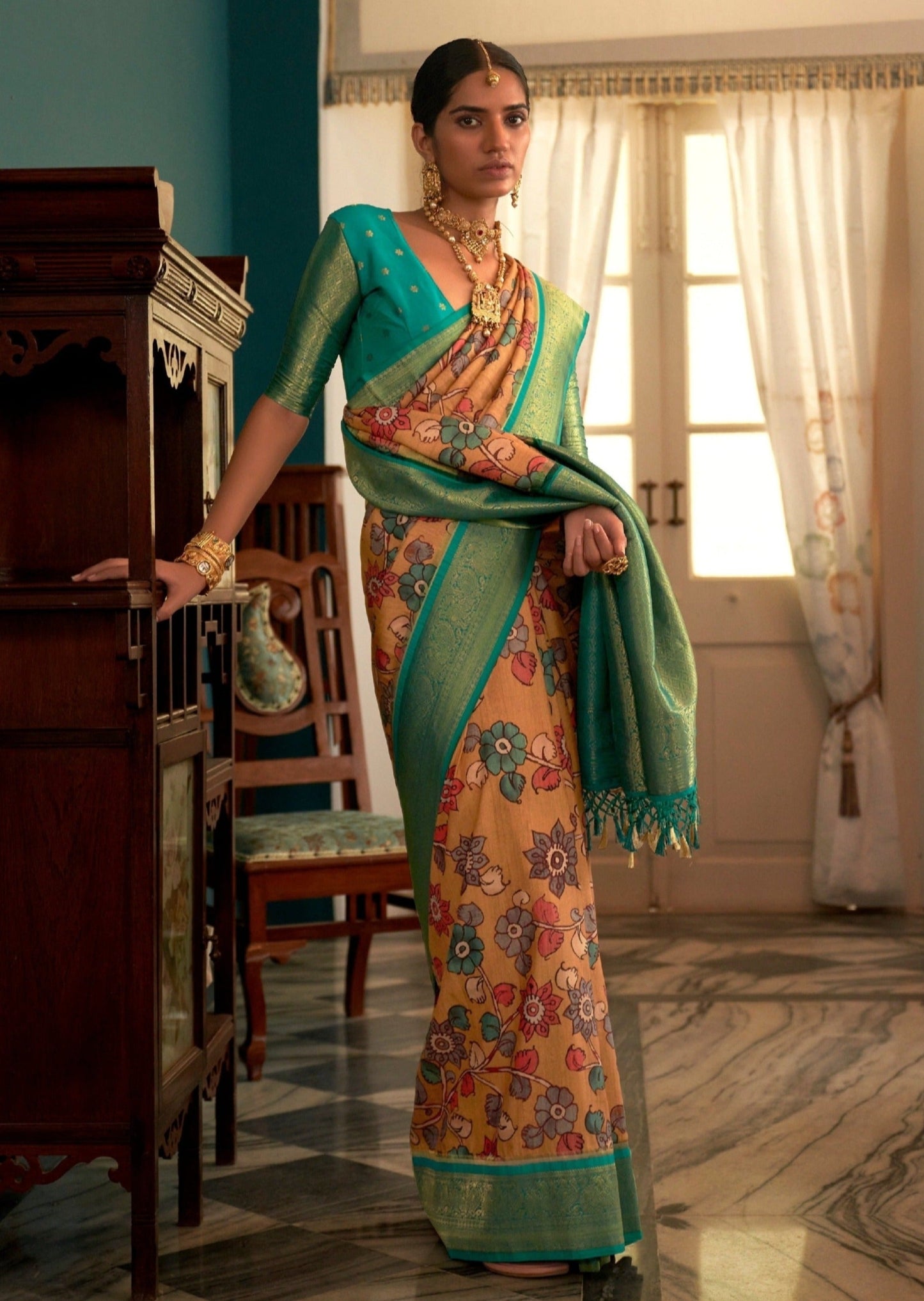 Woman's yellow kalamkari saree with banarasi border online shopping price.