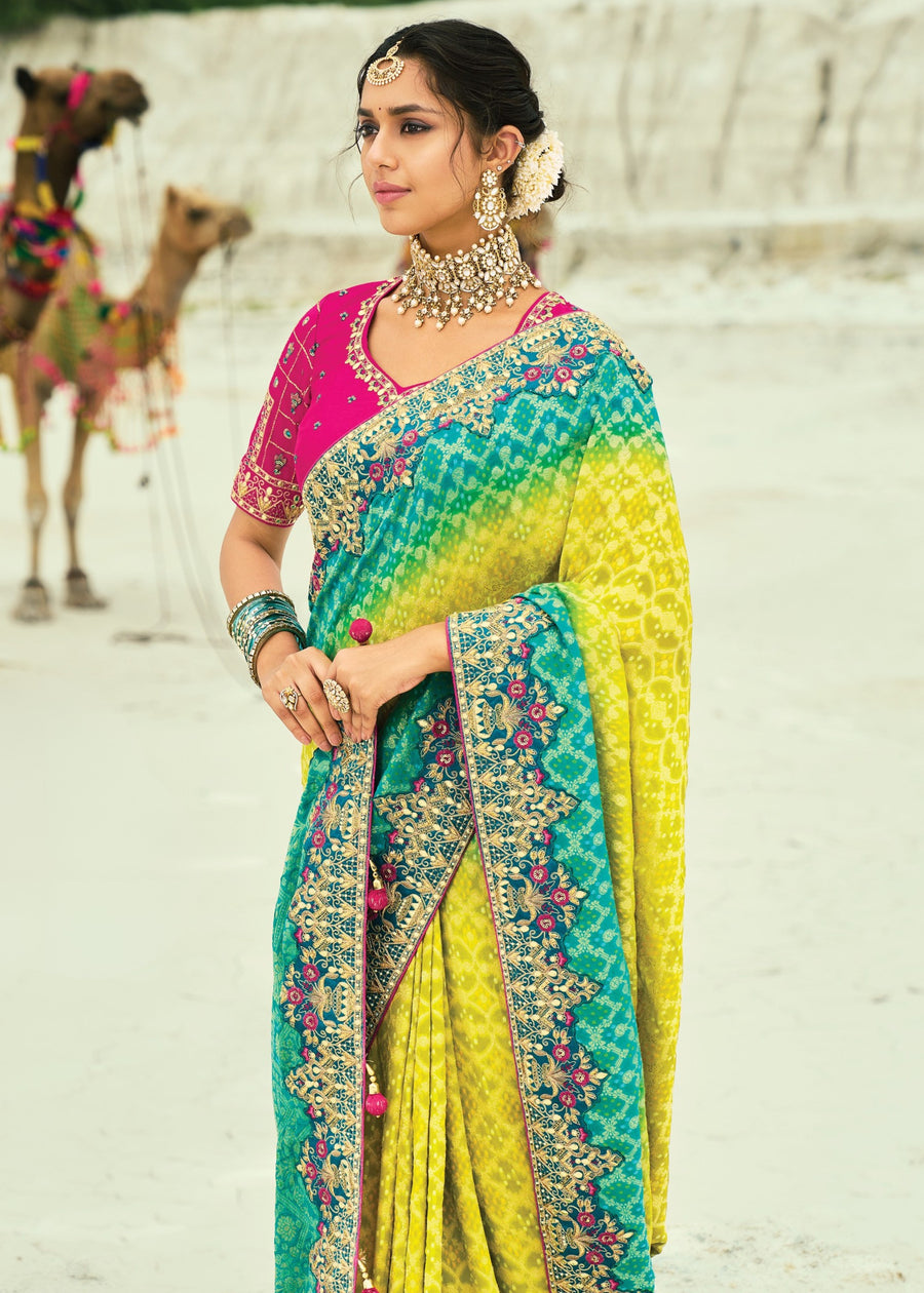 Designer bandhej saree online in yellow turquoise ombre georgette with artisan hand embroidery and festive look.