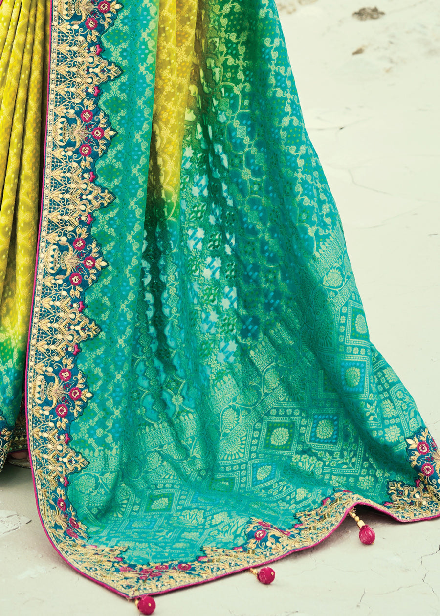 Traditional Indian bandhani saree in yellow blue gradient with embroidered detailing for haldi and navratri.
