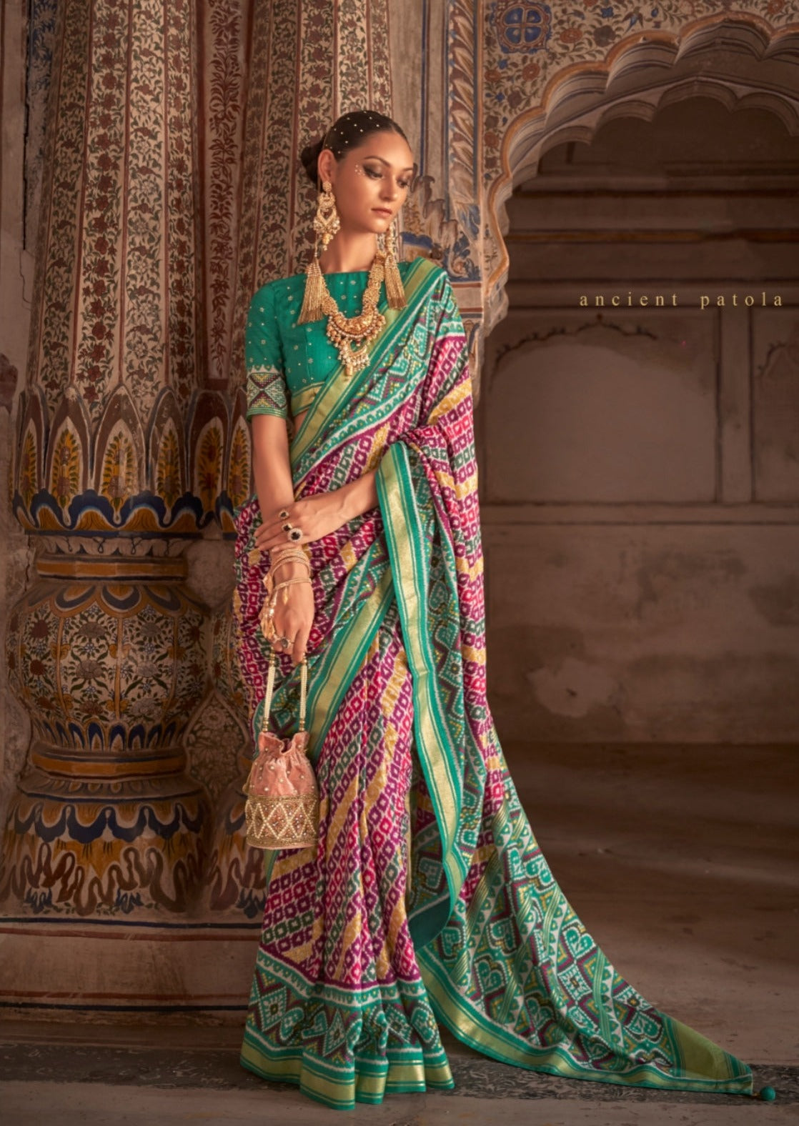 Ikkat Patola Magenta and Green Saree