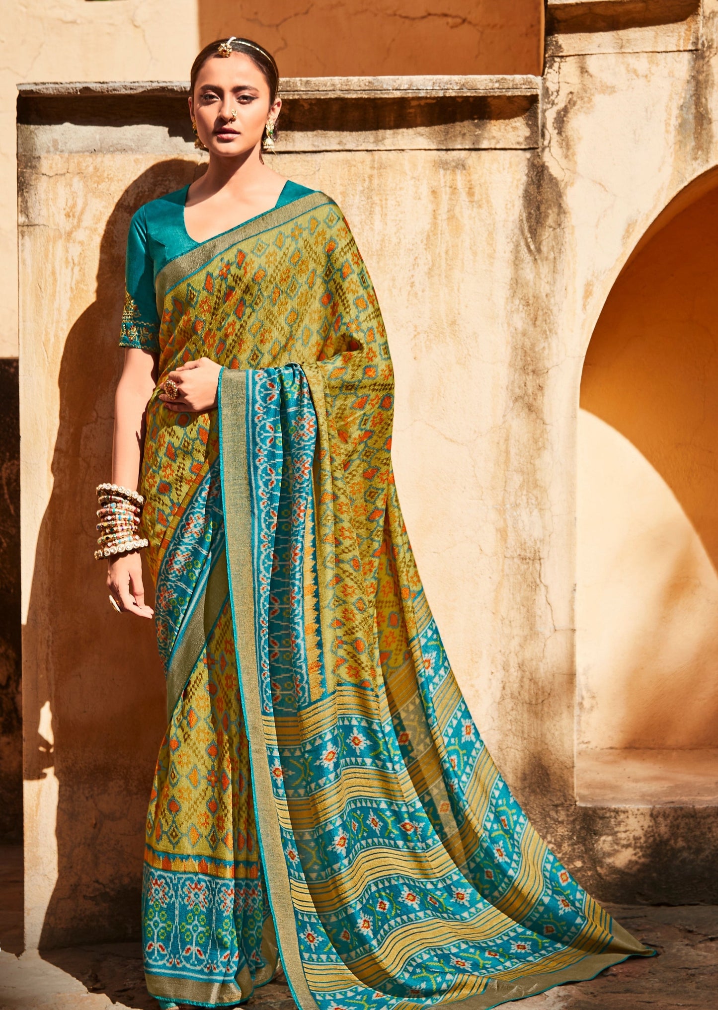 Brasso Silk Olive Green Patola Saree