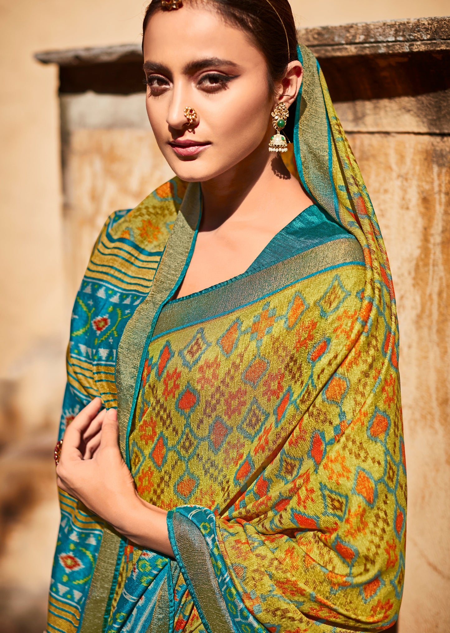 Brasso Silk Olive Green Patola Saree