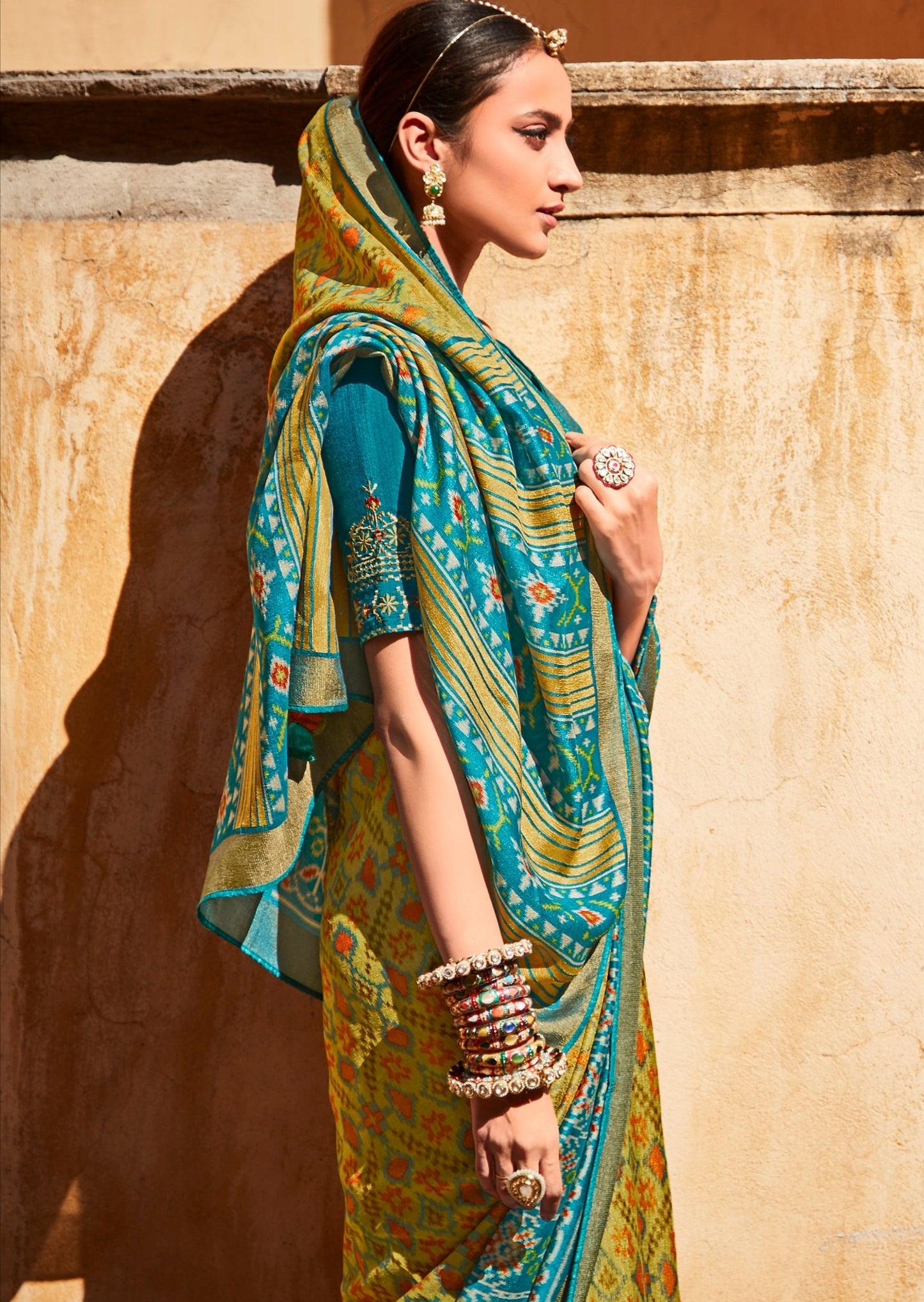 Brasso Silk Olive Green Patola Saree