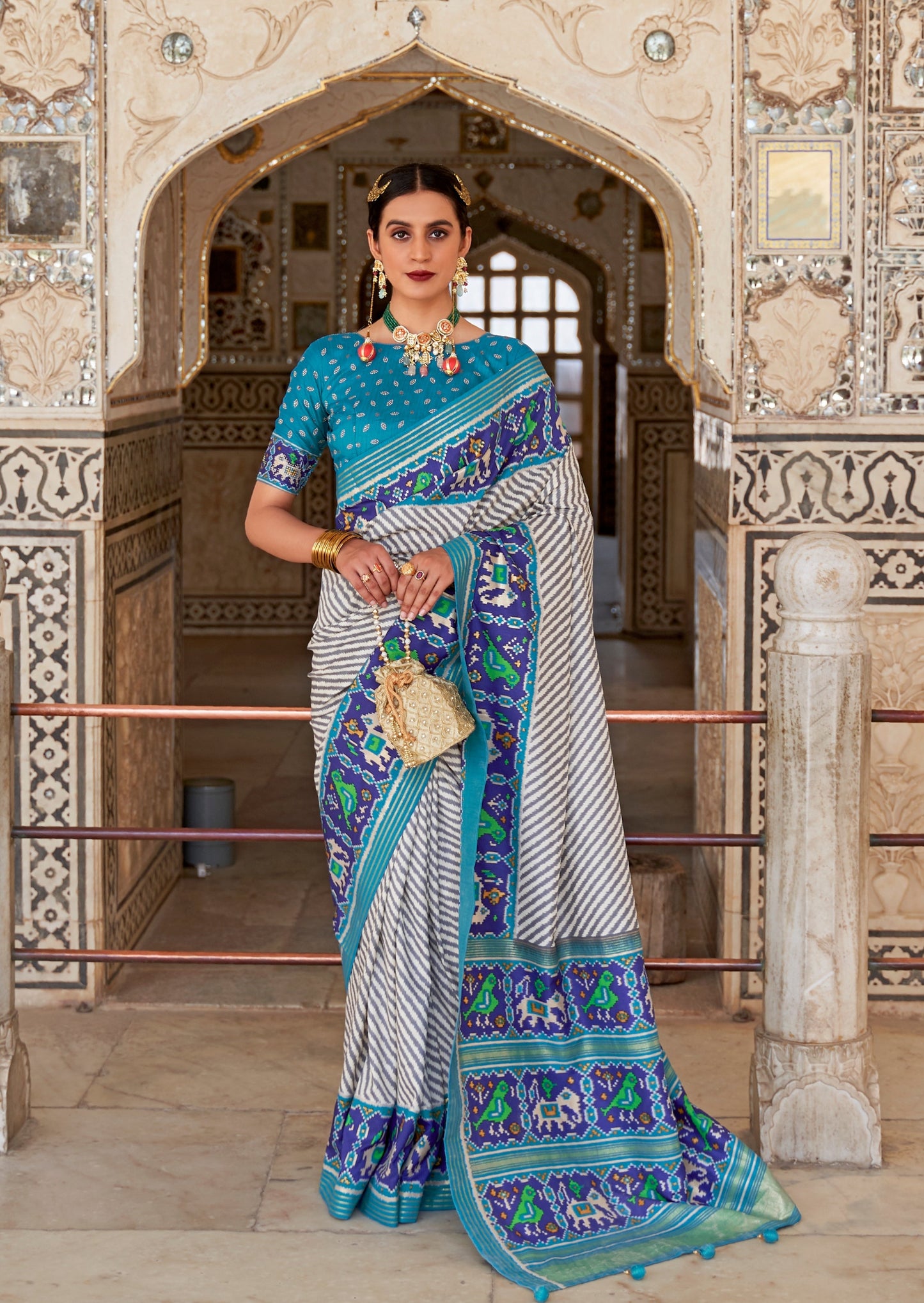 Patola Silk White and Blue Ikat Saree