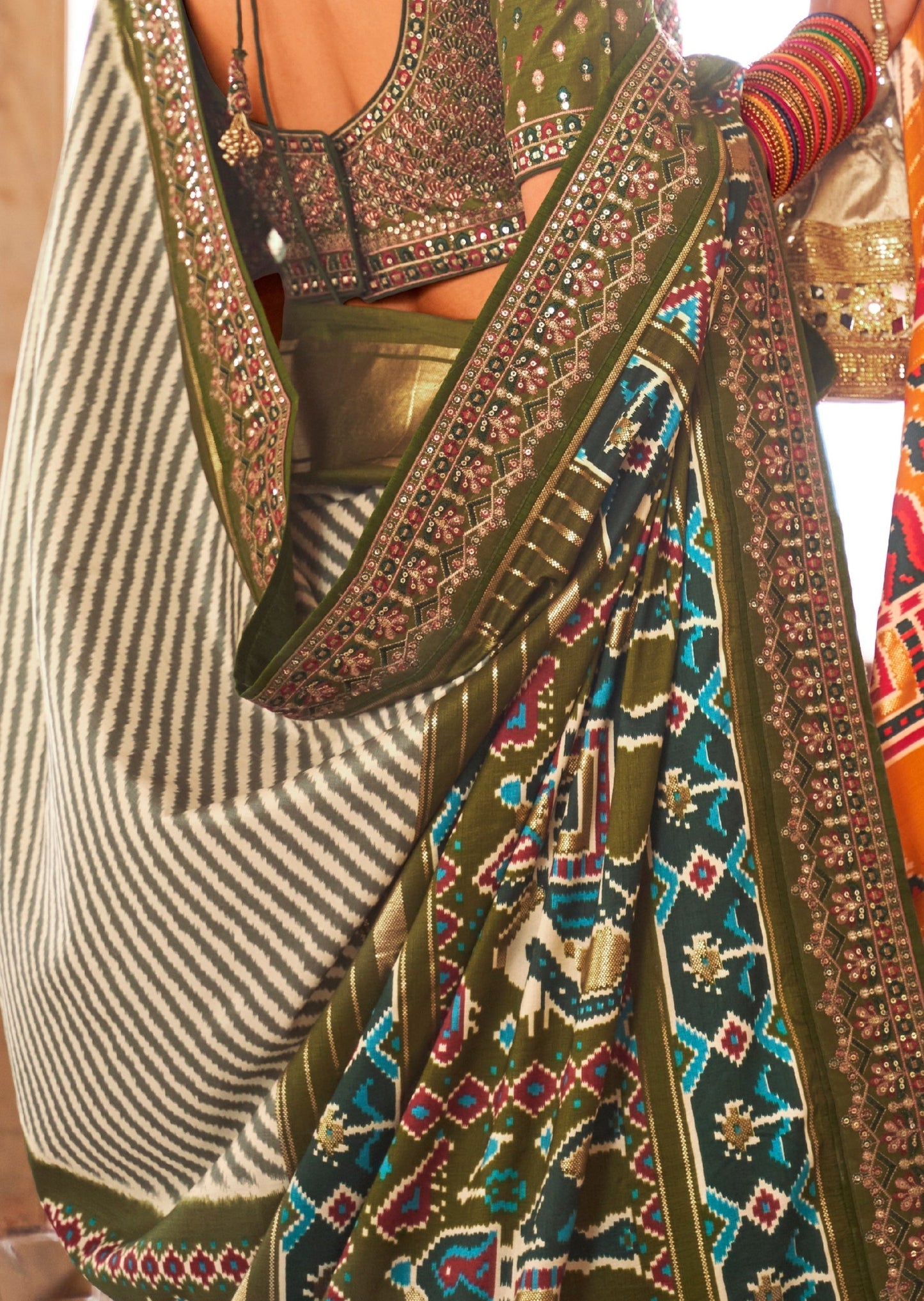 White and Mehendi Green Sequins Patola Saree