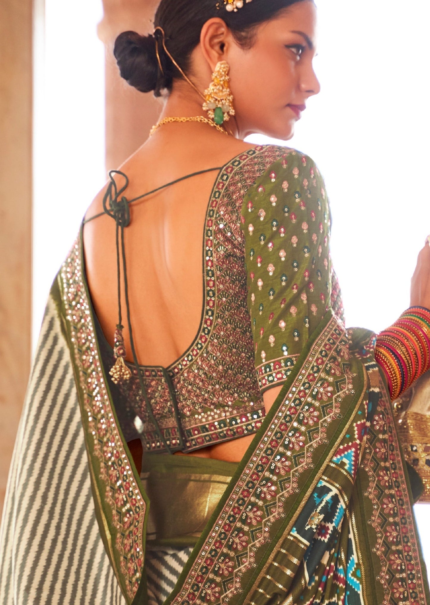 White and Mehendi Green Sequins Patola Saree