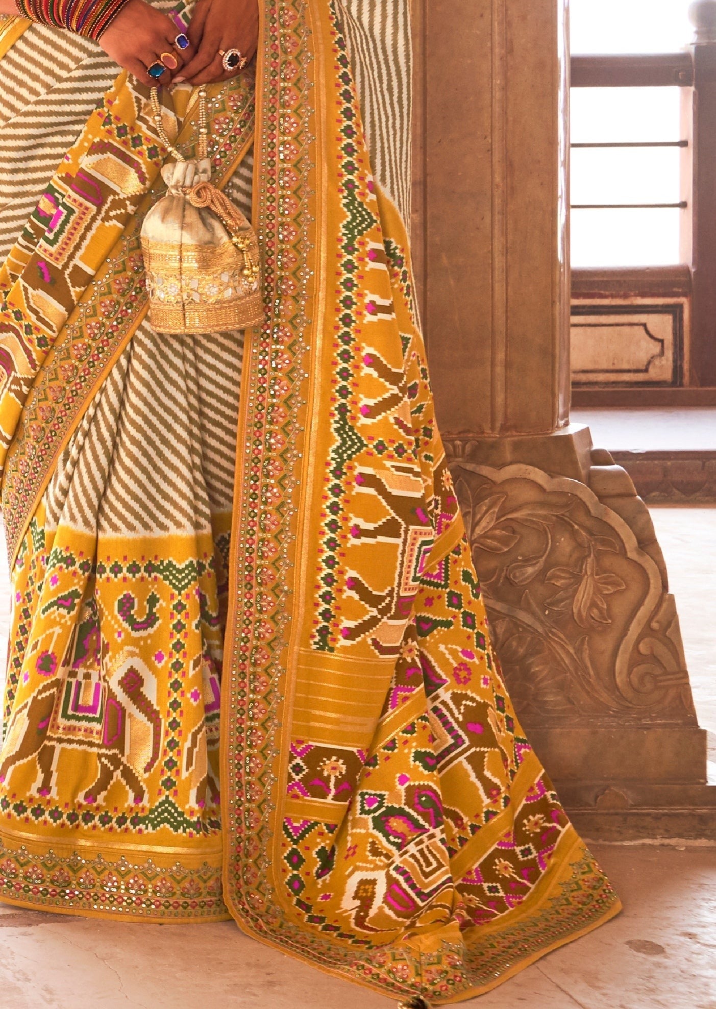 White and Yellow Sequins Patola Saree