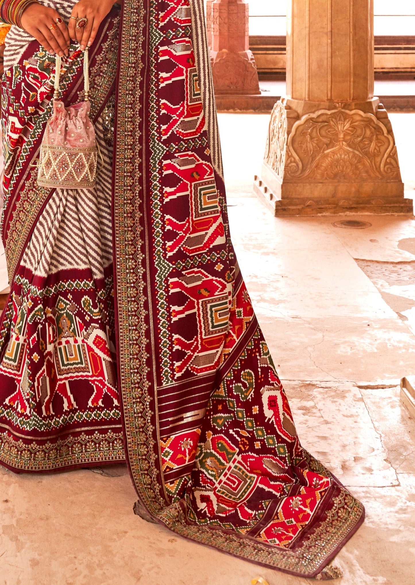 White and Maroon Red Sequins Patola Saree