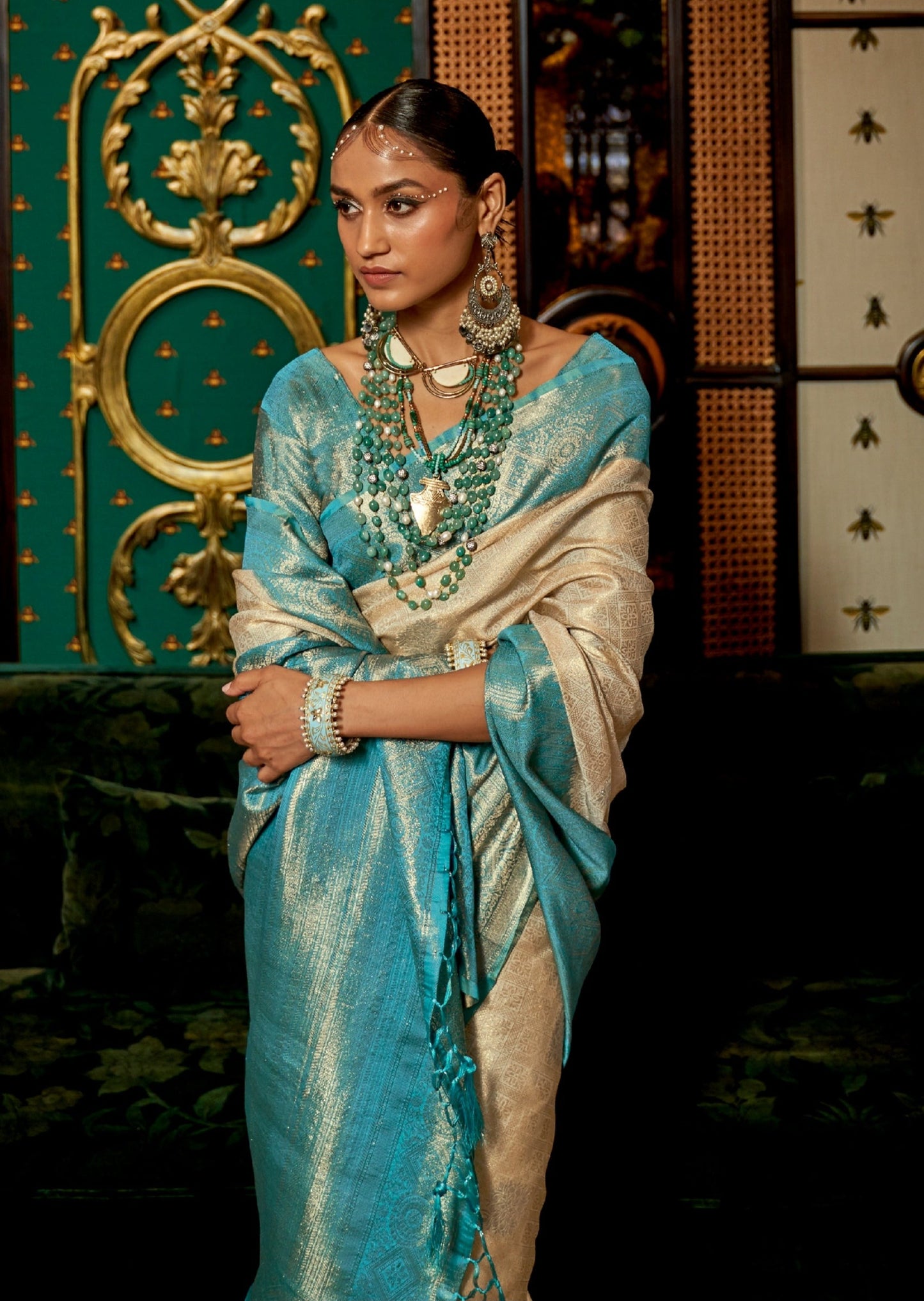 Banarasi silk cream saree online shopping in india & usa with zari work border.