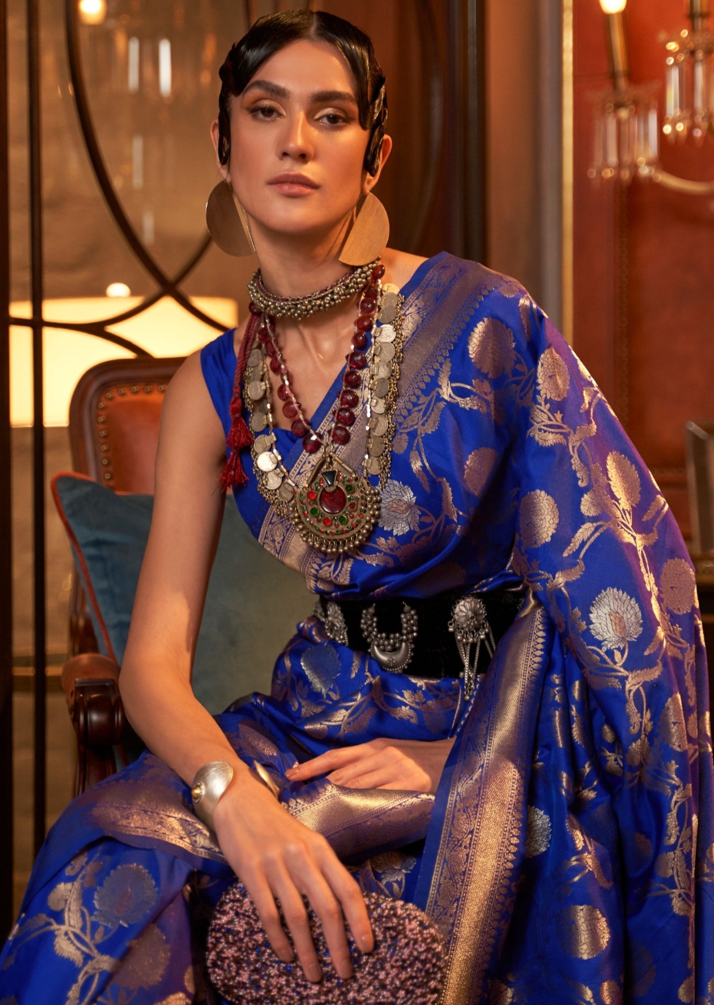 Elegant banarasi silk royal blue saree featuring exquisite handwoven traditional indian attire with intricate gold zari work motifs - perfect for wedding.