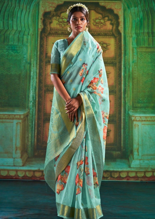 Best linen saree brands in India featuring blue minimalistic saree with digital print available for online shopping.