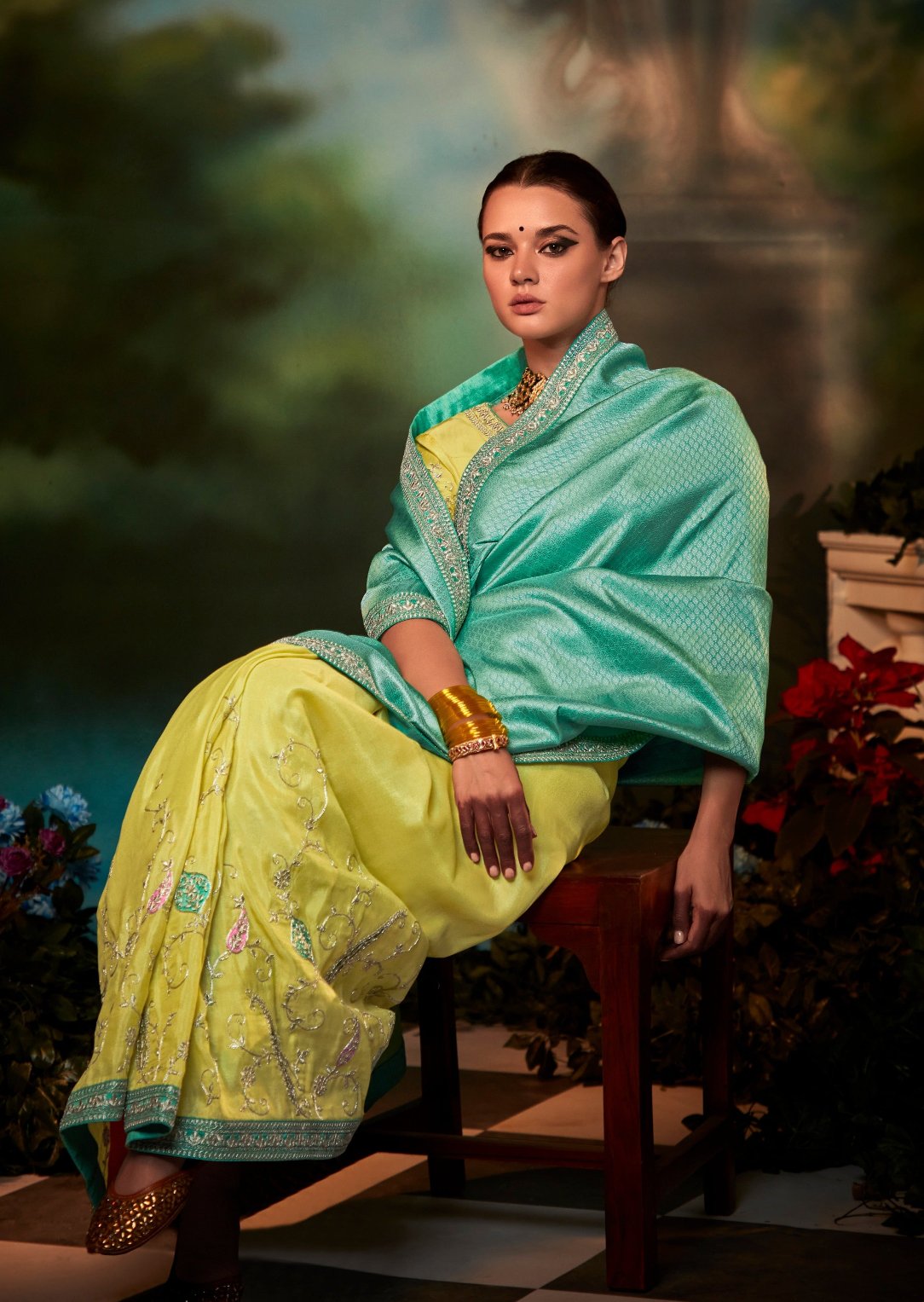 Shop blue banarasi silk saree with contrast yellow blouse for wedding.