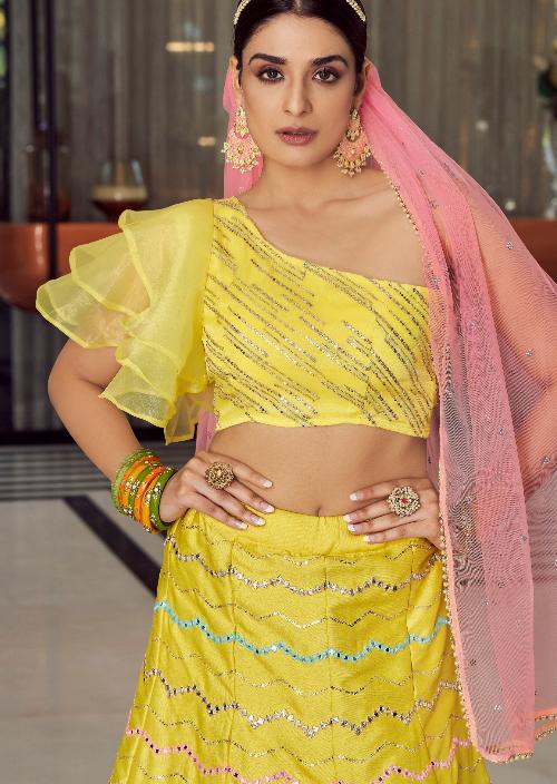 Yellow bridal lehenga choli usa online shopping with contrast pink dupatta.