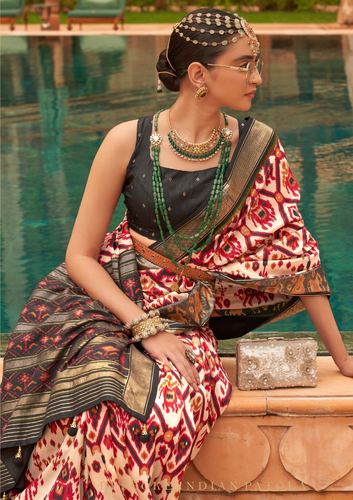 Double ikkat white patola silk saree blouse online price.