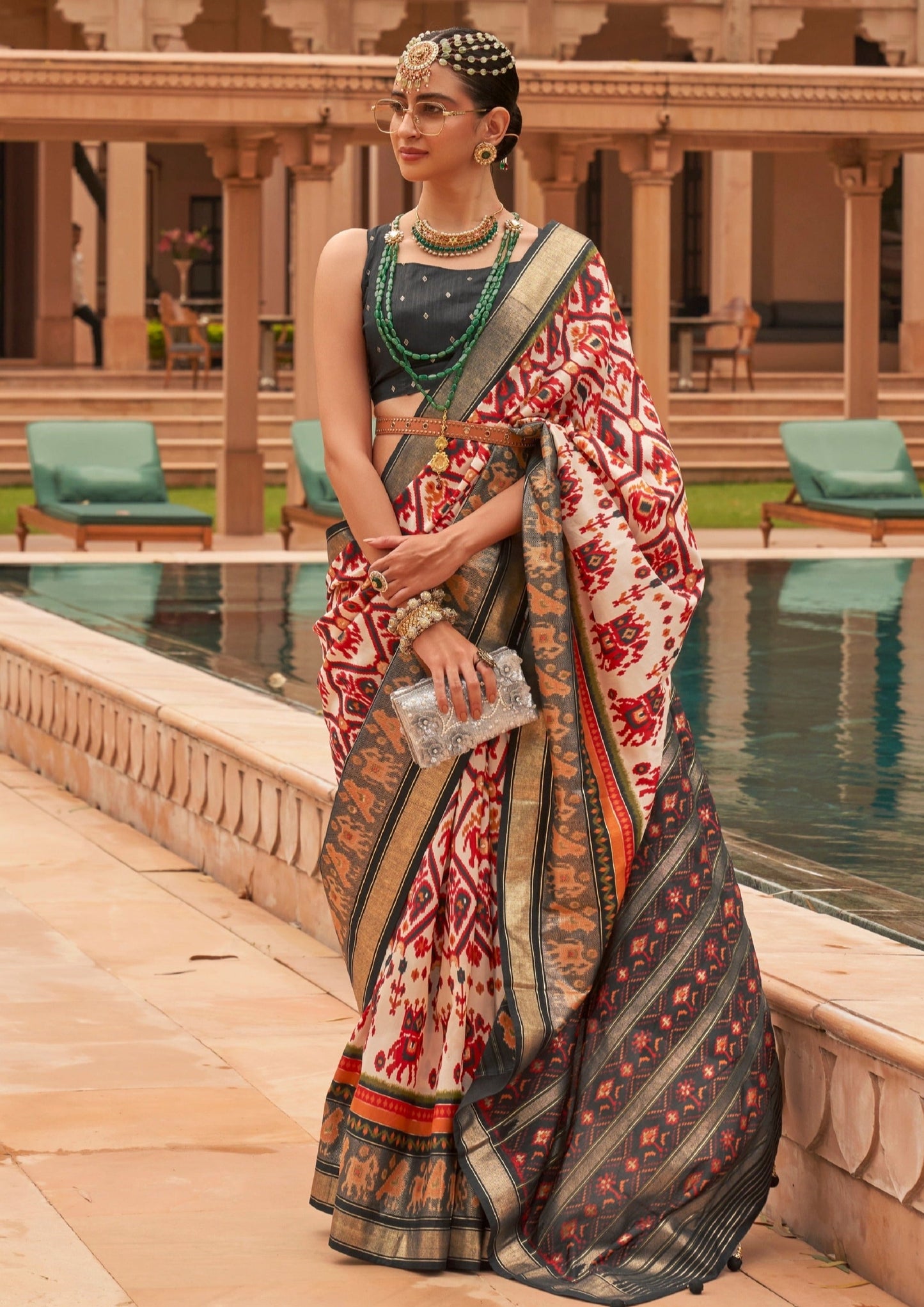 Double Ikkat white patola silk saree online shopping.