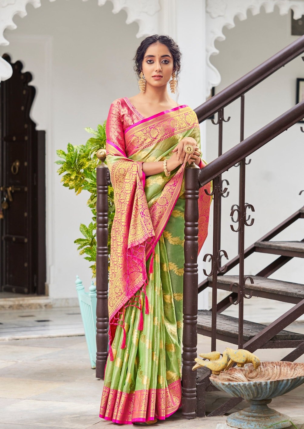 Tissue silk saree online with contrast pink blouse for summer wedding look.