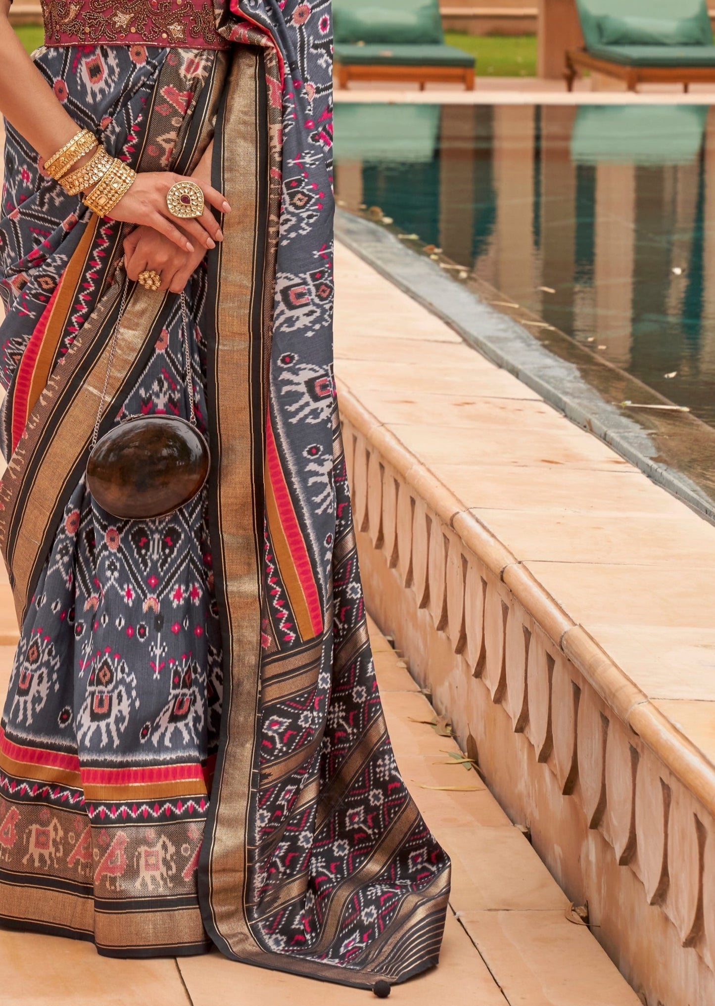 Grey ikat patola saree pallu designs online shopping price.