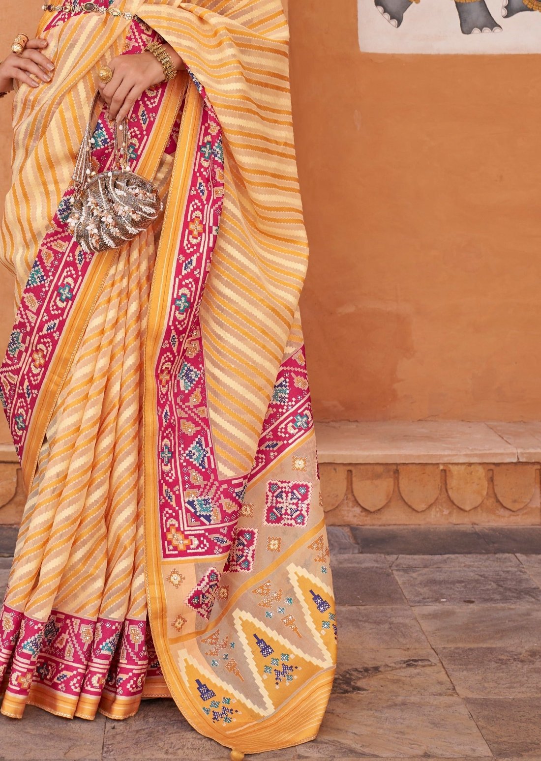 Double ikkat patan patola yellow saree pallu in usa online designs.