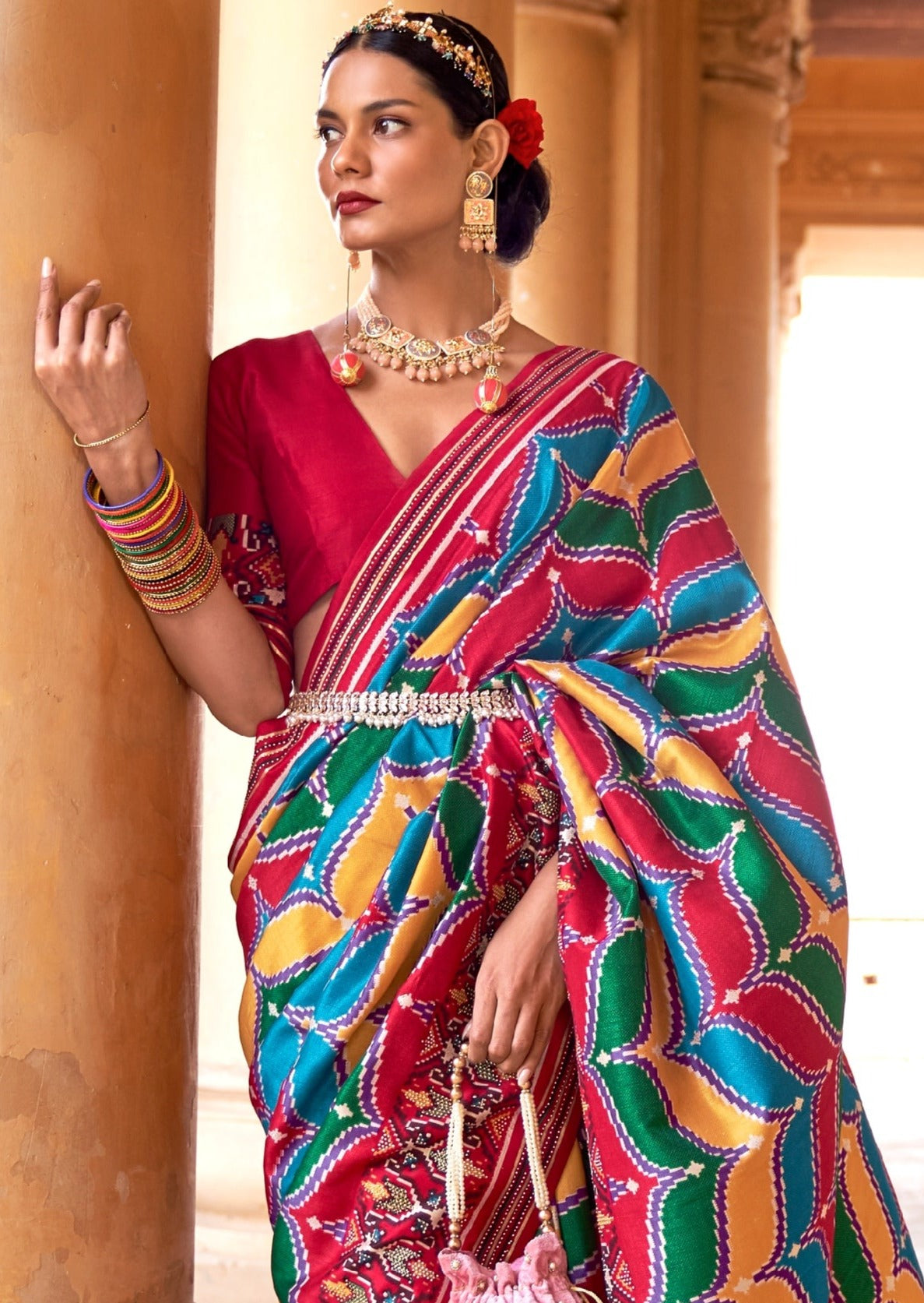 Red multicolor patola silk saree online - buy traditional indian handwoven silk saree with vibrant multicolor patterns and intricate patola designs, perfect for weddings and festivals.
