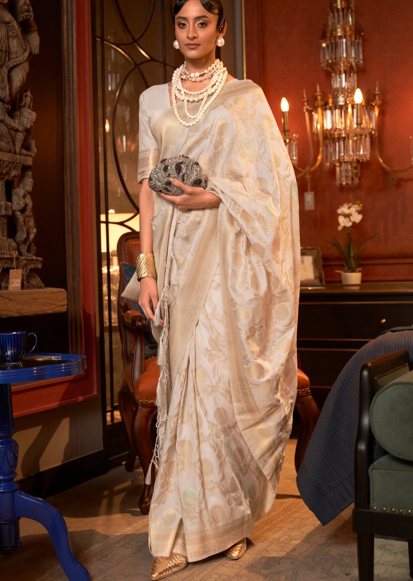 Elegant off white banarasi silk saree handwoven with intricate designs perfect for bridal wear.