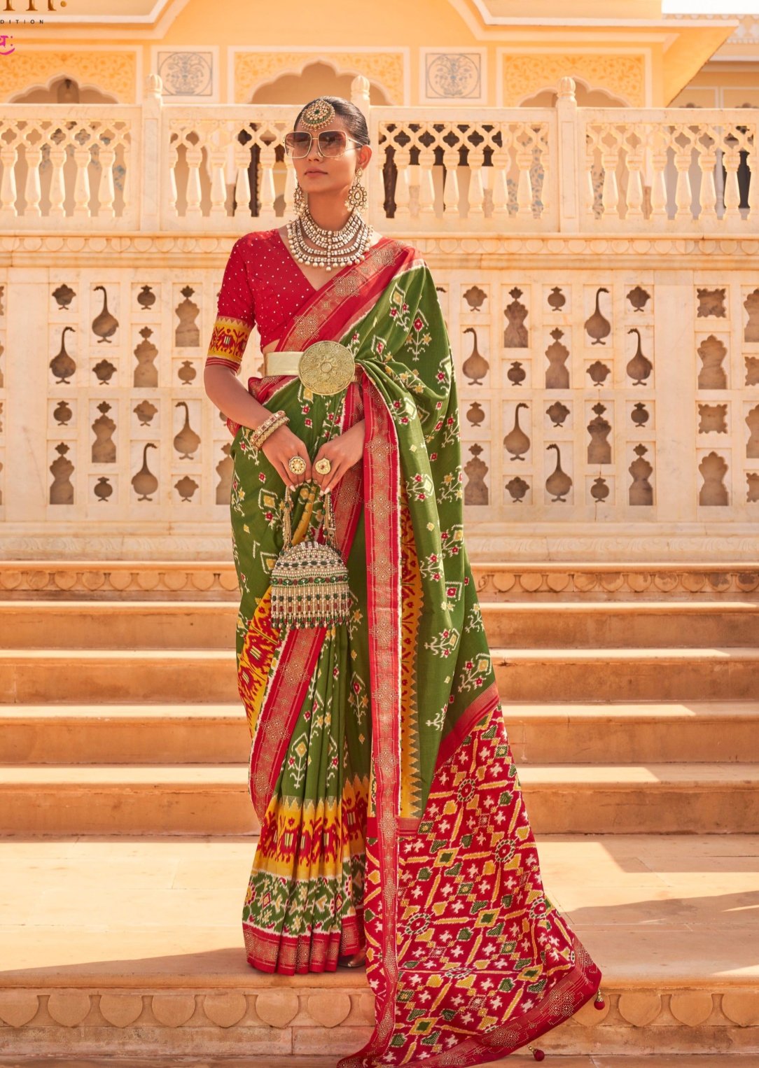 Patan patola green multicolor ikat saree online shopping with price.