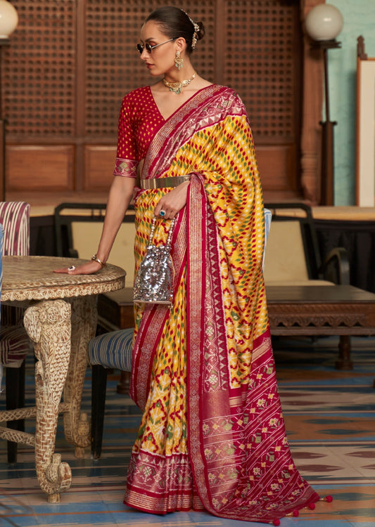 Lady wearing Patan Patola Silk Yellow Saree