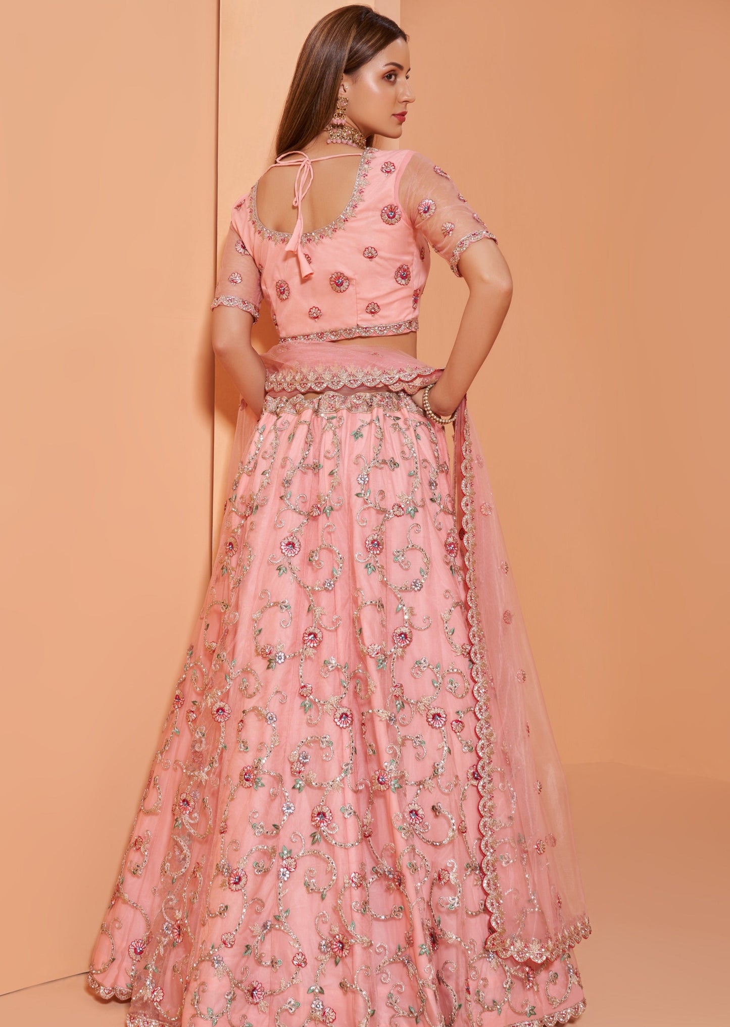 Pink net lehenga choli usa online shopping for wedding function look and Indian bridal wear.
