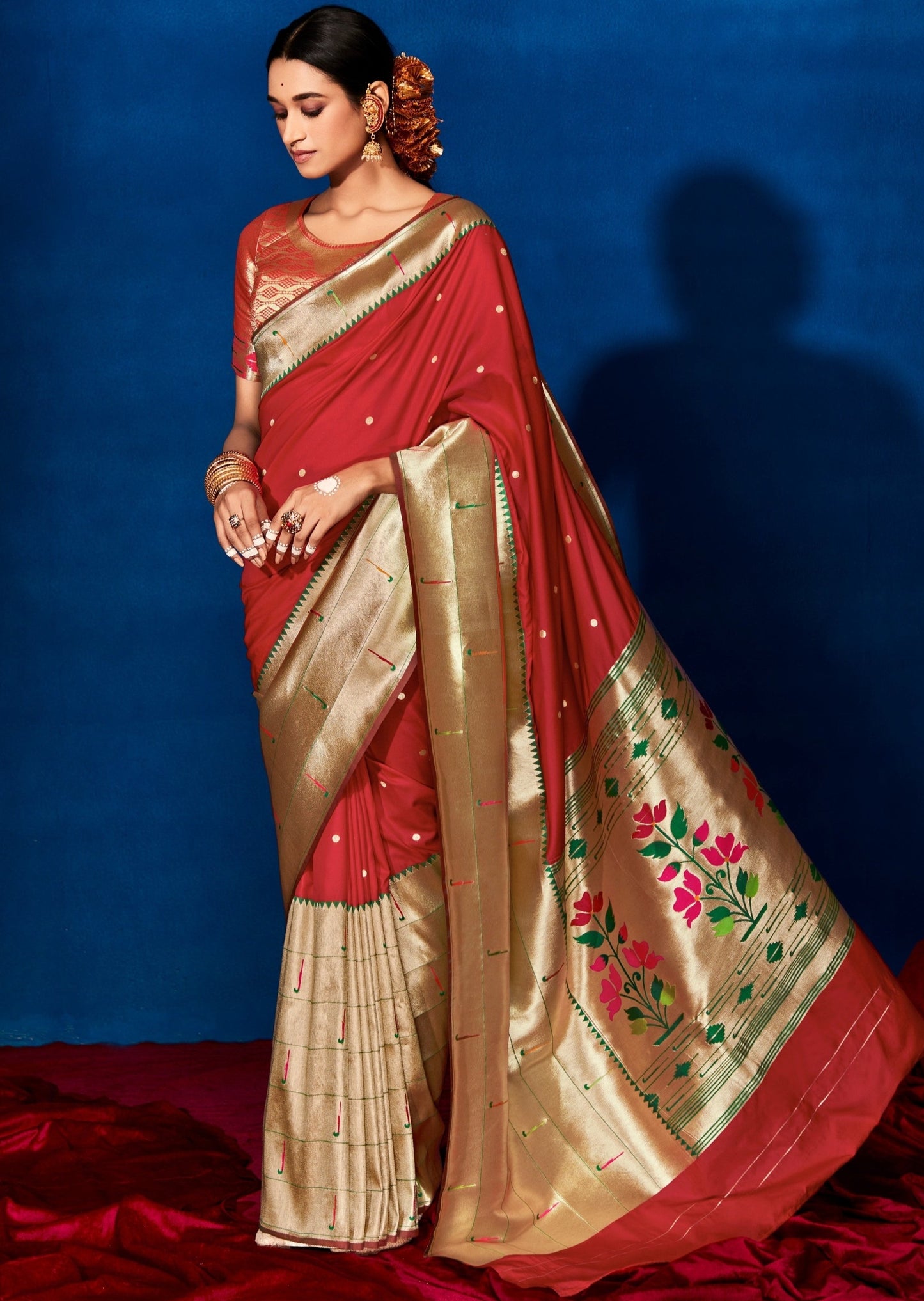 Girl standing in Red saree