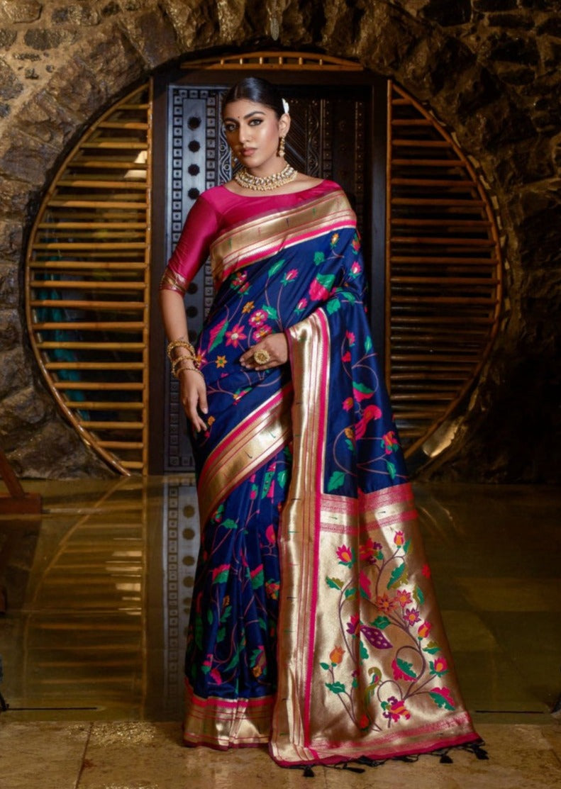 Woman's royal blue paithani silk handloom saree and pink blouse online shopping.