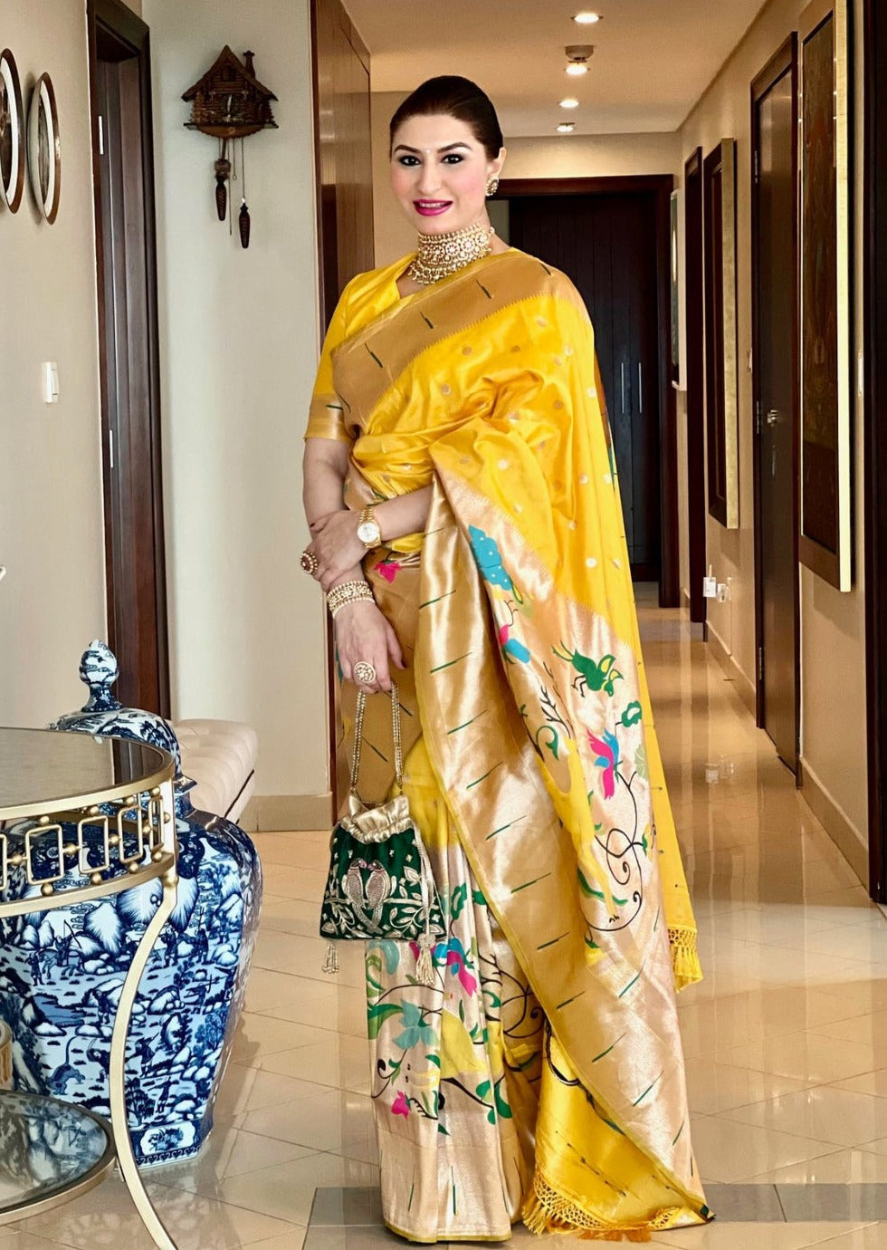 Saree influencer Payal gupta in pure paithani silk yellow saree.
