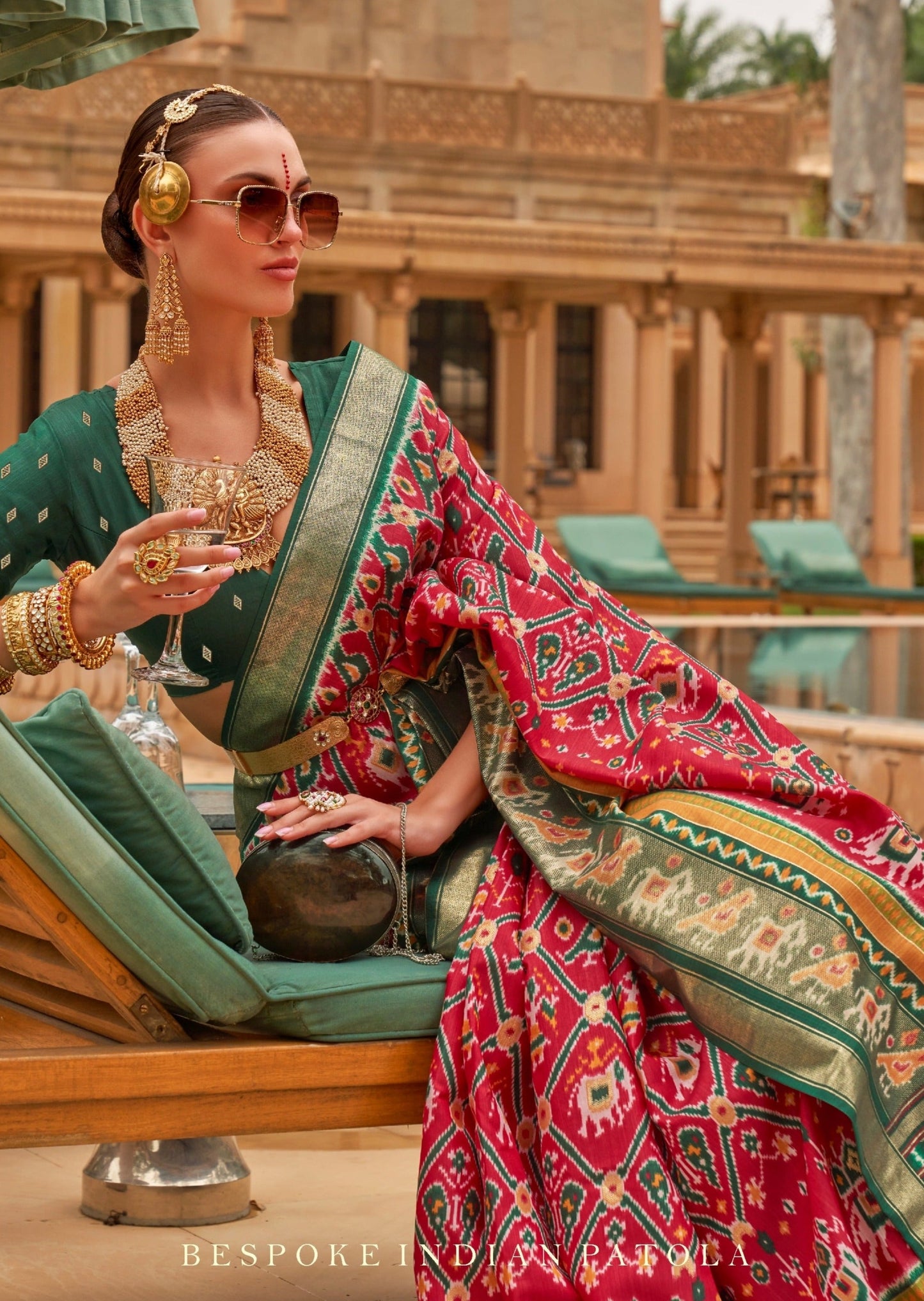 Red double ikkat patola silk saree online shopping price.