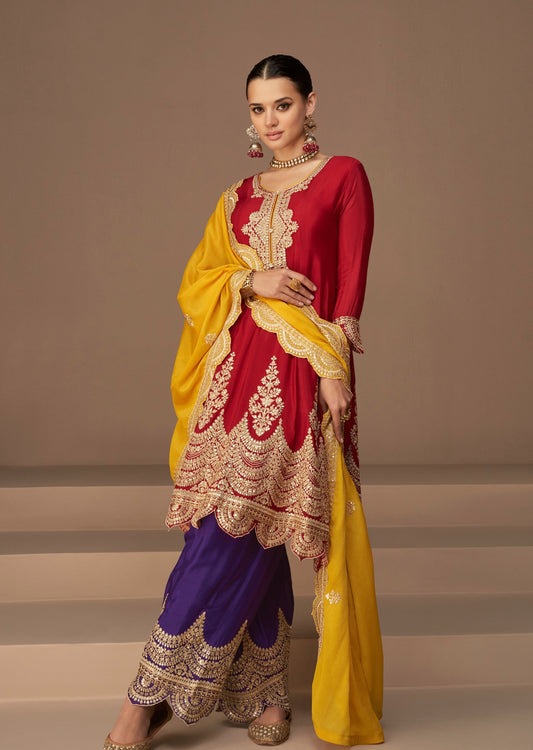 Girl in red silk bridal suit with purple pant.