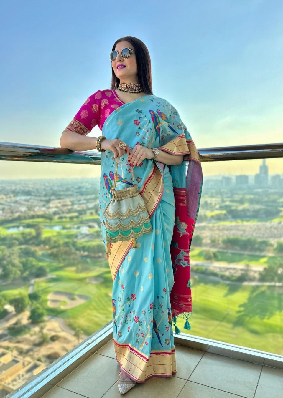 Style by pcg in sky blue paithani silk handloom saree online shopping for indian wedding.