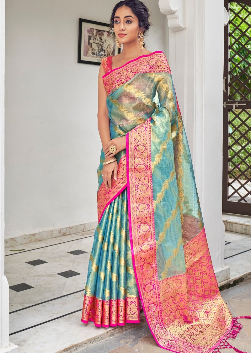 Tissue silk saree online in pastel blue colour with contrast pink blouse for wedding function.