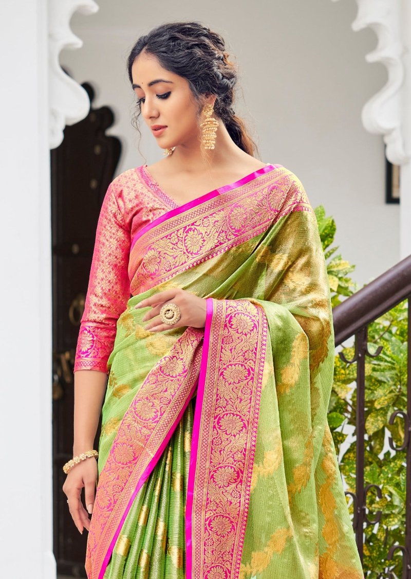 Tissue silk saree with golden border online in lawn green colour.