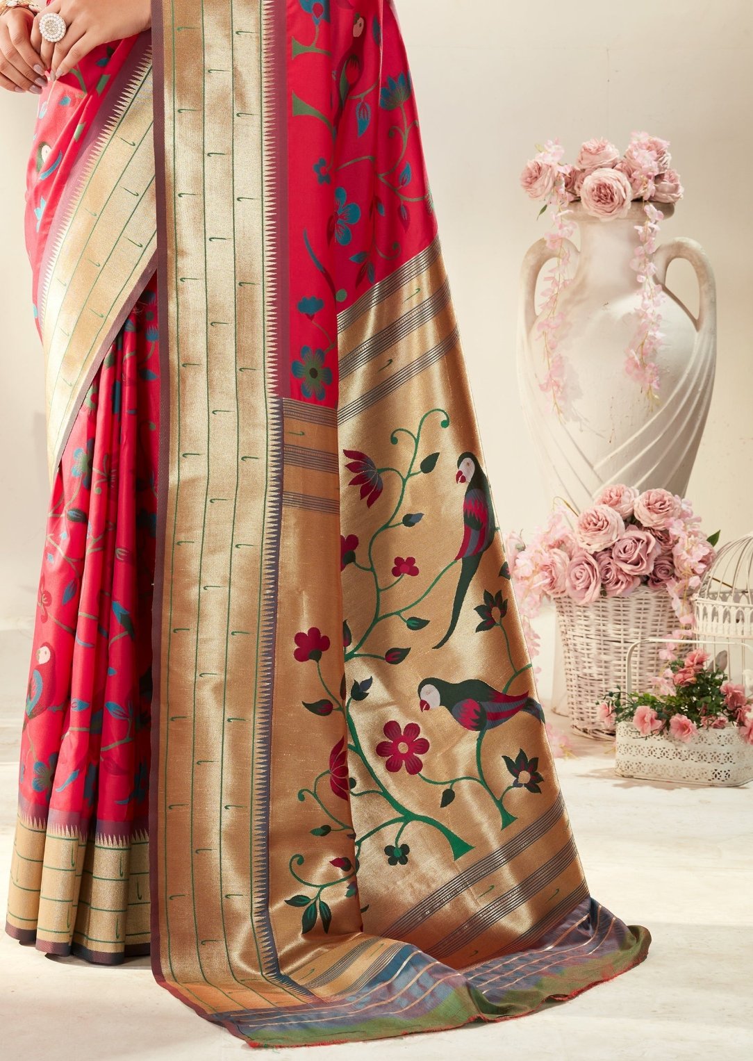 Triple muniya border red paithani saree with parrot design.