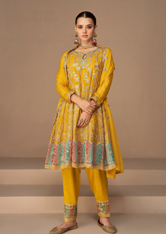 Bride in turmeric yellow bridal suit