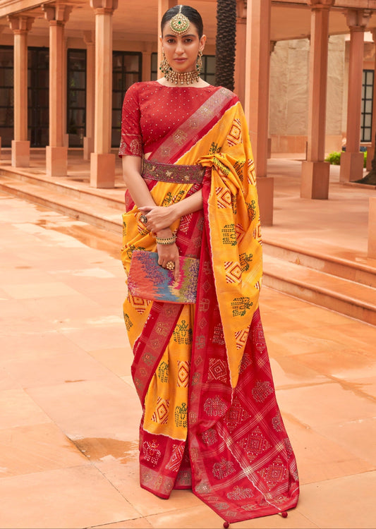 Patola saree original design in yellow red colour combination available for online shopping.