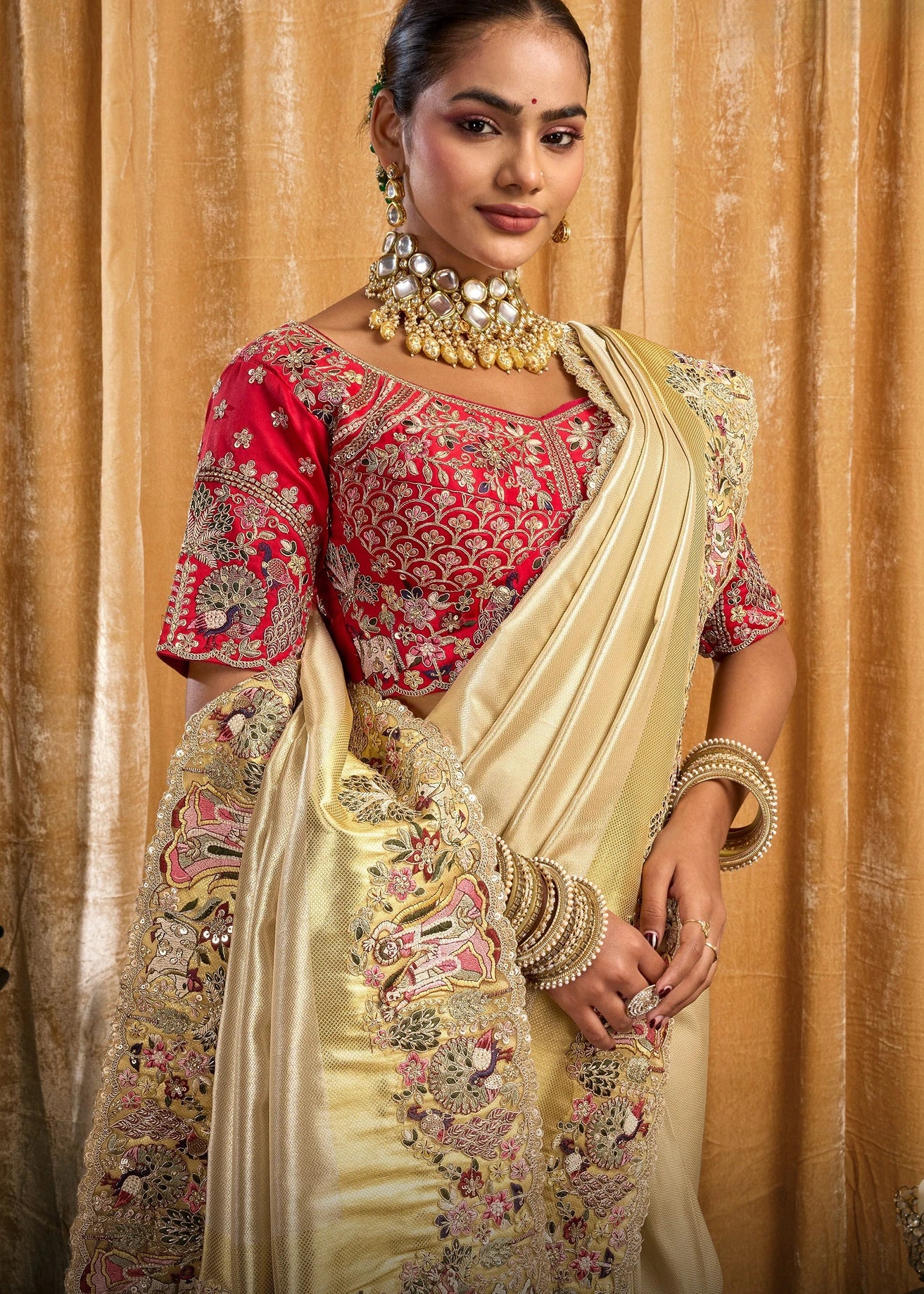 Cream Kanjivaram Silk Embroidered Bridal Saree & Red Blouse