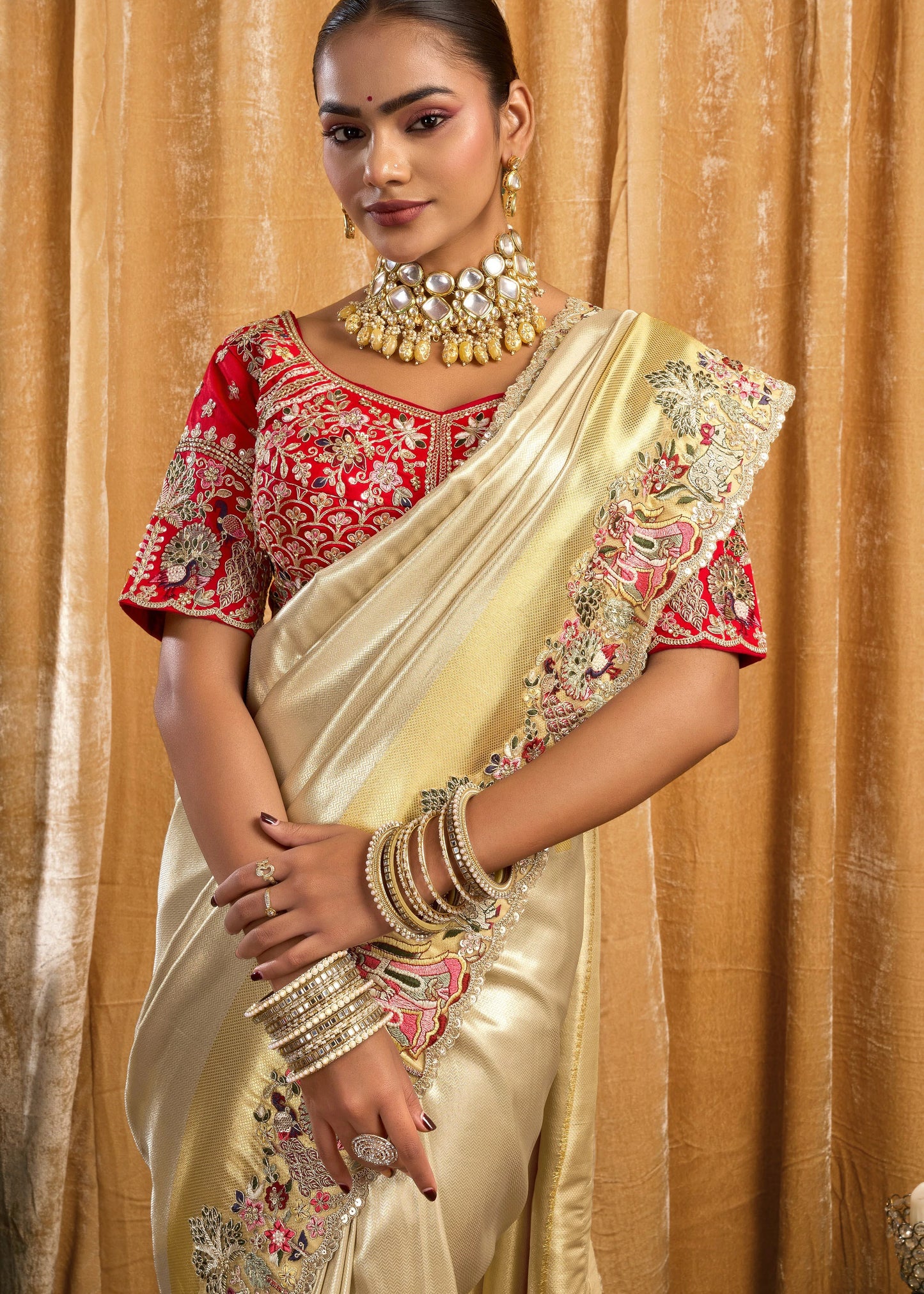 Cream Kanjivaram Silk Embroidered Bridal Saree & Red Blouse