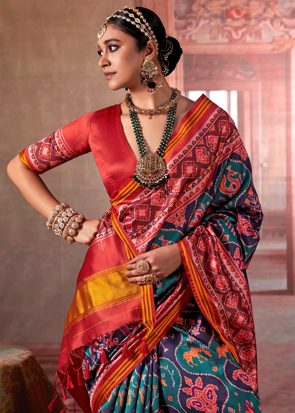 Designer Teal Green and Red Patola Silk Saree