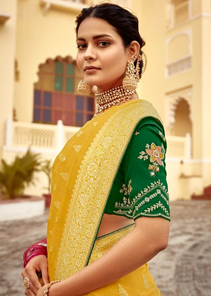 Dola Banarasi Silk Yellow Saree With Contrast Green Embroidered Blouse