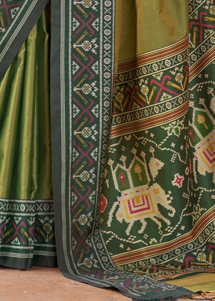 Mehendi Green Patola Silk Saree With Dark Green Blouse